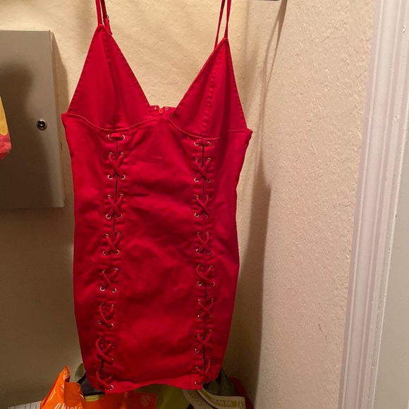 Red Strapless Skinny Dress with Cross Hatches Along The Sides - Picture 1 of 7